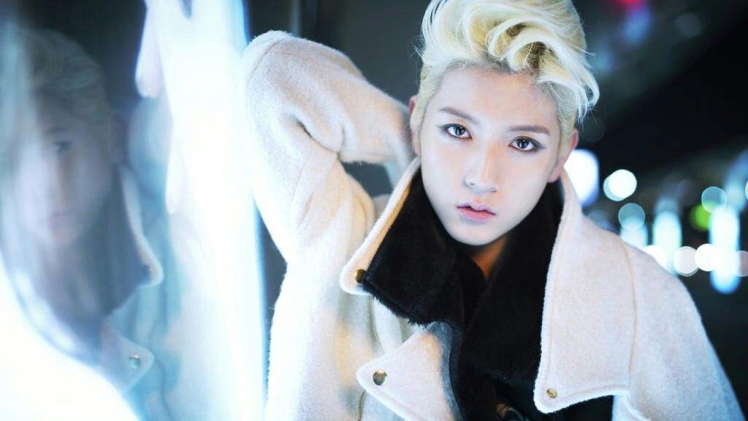 A popular Korean rap group, NU’EST, has black hair and “girly” blonde skin.
